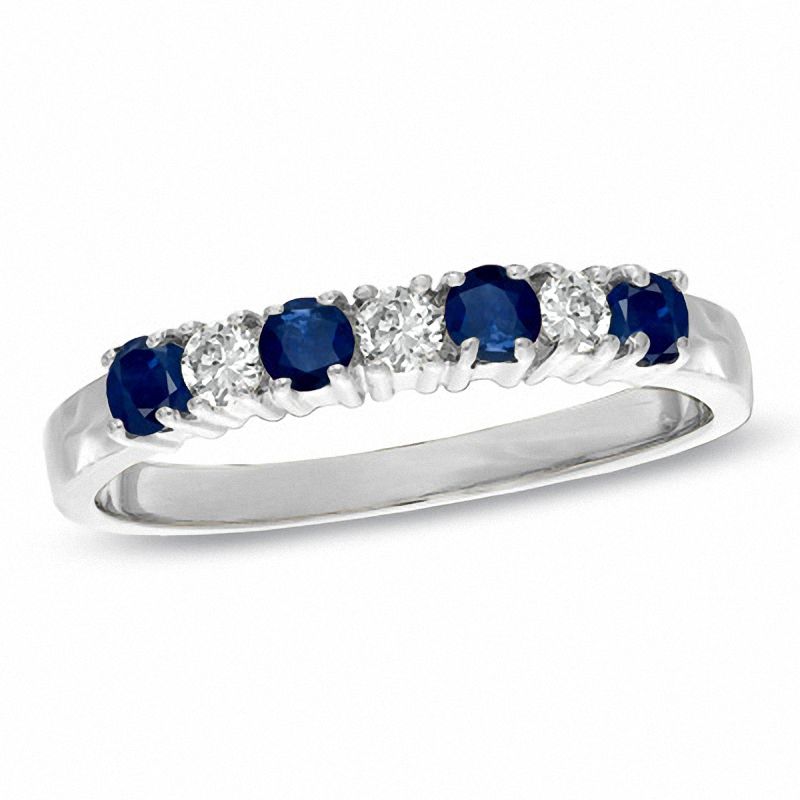 Blue Sapphire and 1/7 CT. T.W. Diamond Seven Stone Band in 14K White Gold