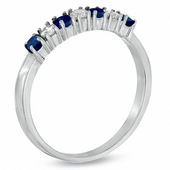 Blue Sapphire and 1/7 CT. T.w. Diamond Seven Stone Band in 14K White Gold