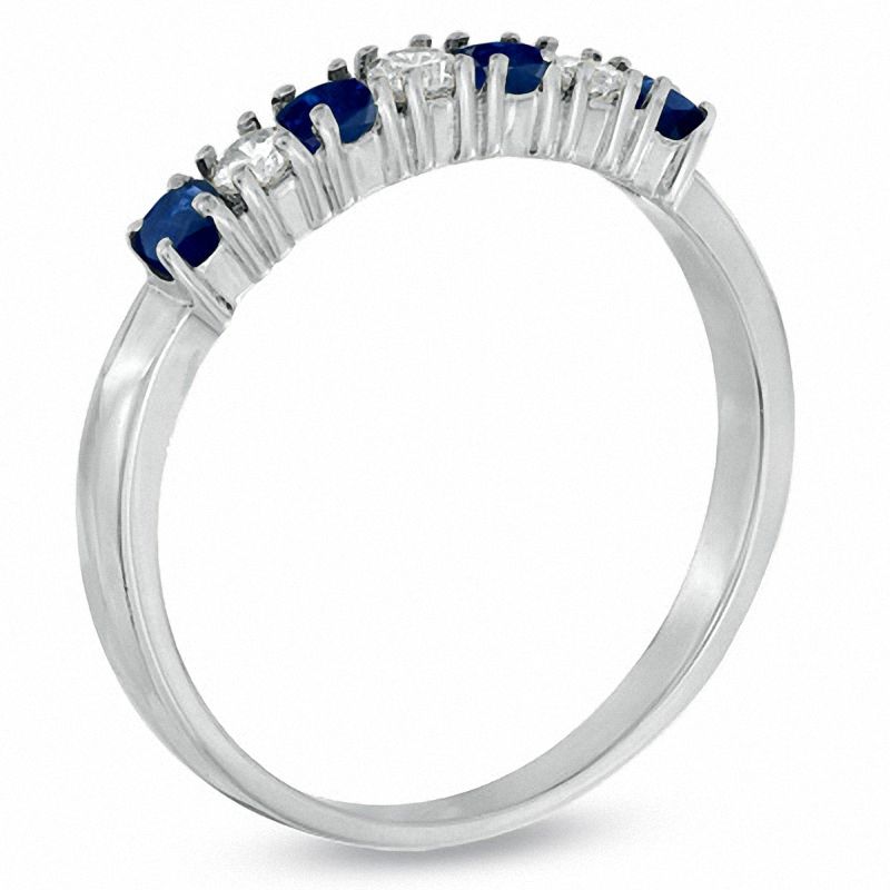 Blue Sapphire and 1/7 CT. T.W. Diamond Seven Stone Band in 14K White Gold