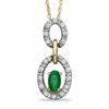 Thumbnail Image 1 of Oval Emerald and 1/8 CT. T.W. Diamond Double Circle Frame Pendant in 10K Gold