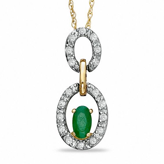 Oval Emerald and 1/8 CT. T.w. Diamond Double Circle Frame Pendant in 10K Gold