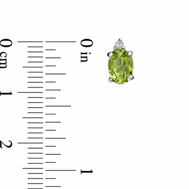Main Image 4 of Oval Peridot and Diamond Accent Pendant, Ring and Earrings Set in Sterling Silver - Size 7