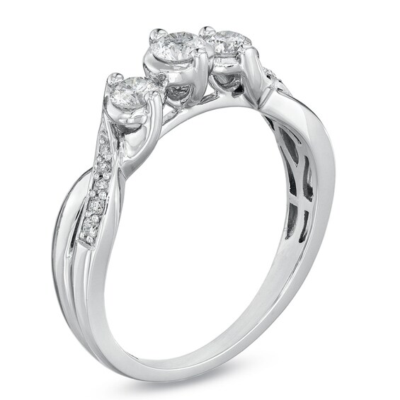 1/2 CT. T.w. Diamond Three Stone Engagement Ring in 14K White Gold