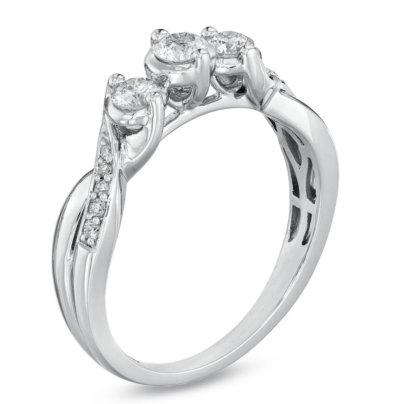 1/2 CT. T.W. Diamond Three Stone Engagement Ring in 14K