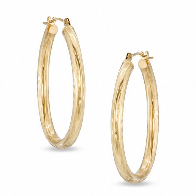 Main Image 1 of 30mm Diamond-Cut Oval Hoop Earrings in 14K Gold