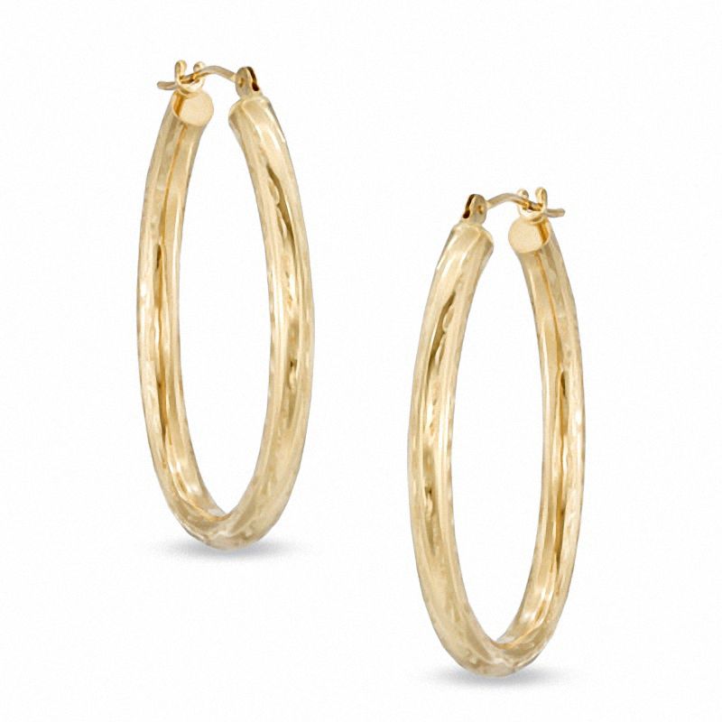 Main Image 1 of 30mm Diamond-Cut Oval Hoop Earrings in 14K Gold
