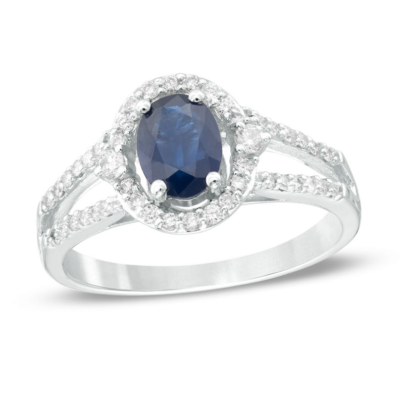 Oval Blue Sapphire and 1/3 CT. T.W. Diamond Frame Ring in 10K White Gold