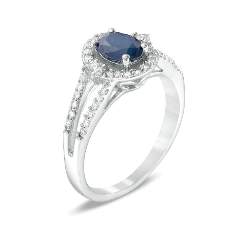 Oval Blue Sapphire and 1/3 CT. T.W. Diamond Frame Ring in 10K White Gold