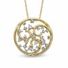 1/3 CT. T.w. Diamond Filigree Circle Pendant in 10K Gold