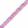 Thumbnail Image 1 of Oval Lab-Created Pink Sapphire and Diamond Accent Bracelet in Sterling Silver - 7.25"
