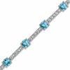 Thumbnail Image 1 of Swiss Blue Topaz and Lab-Created White Sapphire Bracelet in Sterling Silver - 7.25"