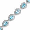 Thumbnail Image 0 of Pear-Shaped Swiss Blue Topaz and Diamond Accent Bracelet in Sterling Silver - 7.25"