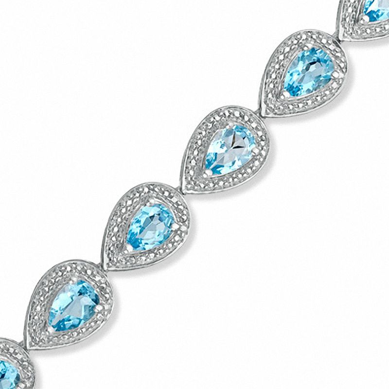 Main Image 1 of Pear-Shaped Swiss Blue Topaz and Diamond Accent Bracelet in Sterling Silver - 7.25&quot;