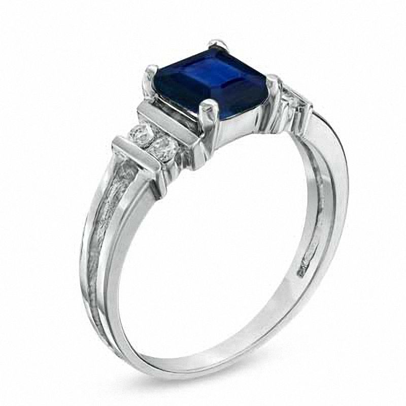 Emerald-Cut Blue Sapphire and 1/10 CT. T.W. Diamond Engagement Ring in 14K White Gold