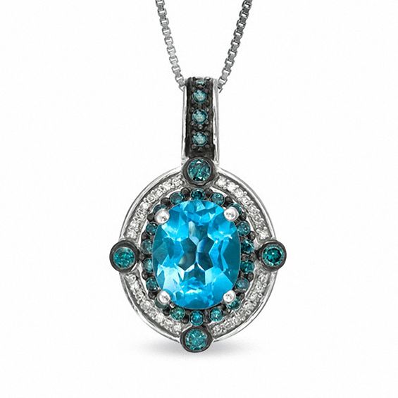 Oval Blue Topaz and 1/2 CT. T.w. Enhanced Blue and White Diamond Pendant in Sterling Silver