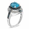 Thumbnail Image 1 of Oval Blue Topaz and 3/4 CT. T.W. Enhanced Blue and White Diamond Ring in Sterling Silver