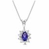 Thumbnail Image 0 of Oval Tanzanite and 1/7 CT. T.W. Diamond Frame Pendant in 14K White Gold