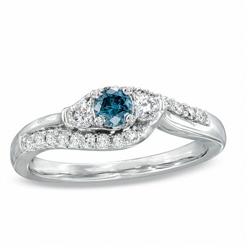 Main Image 1 of 1/2 CT. T.W. Enhanced Blue and White Diamond Three Stone Wave Ring in 10K White Gold