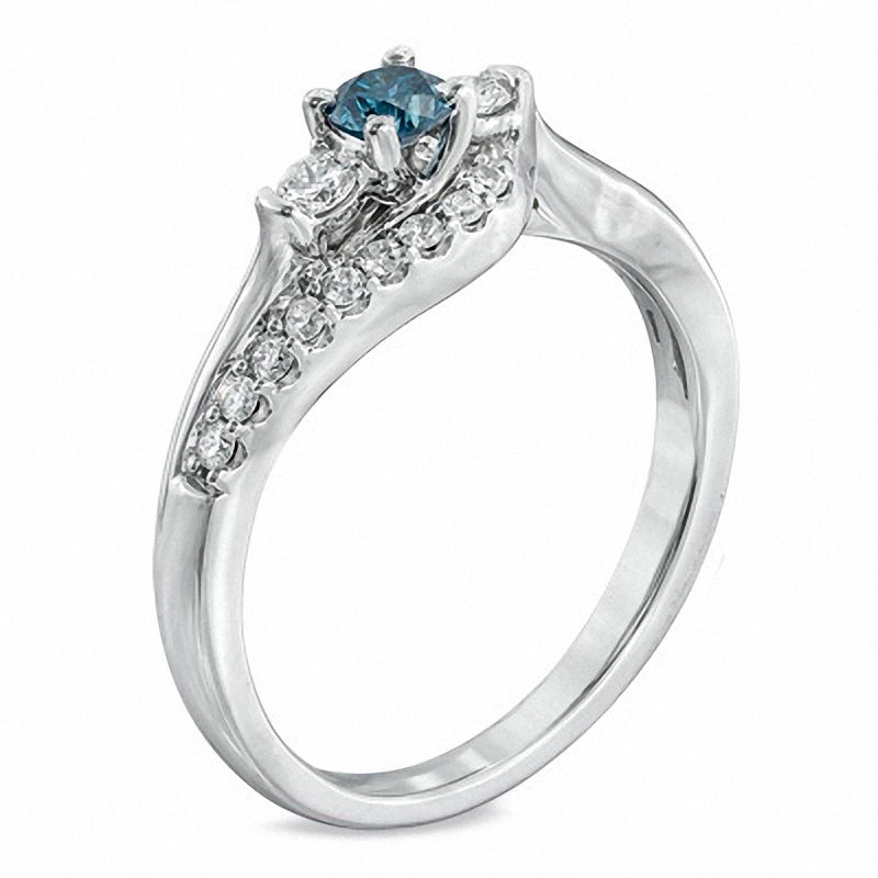 Main Image 2 of 1/2 CT. T.W. Enhanced Blue and White Diamond Three Stone Wave Ring in 10K White Gold