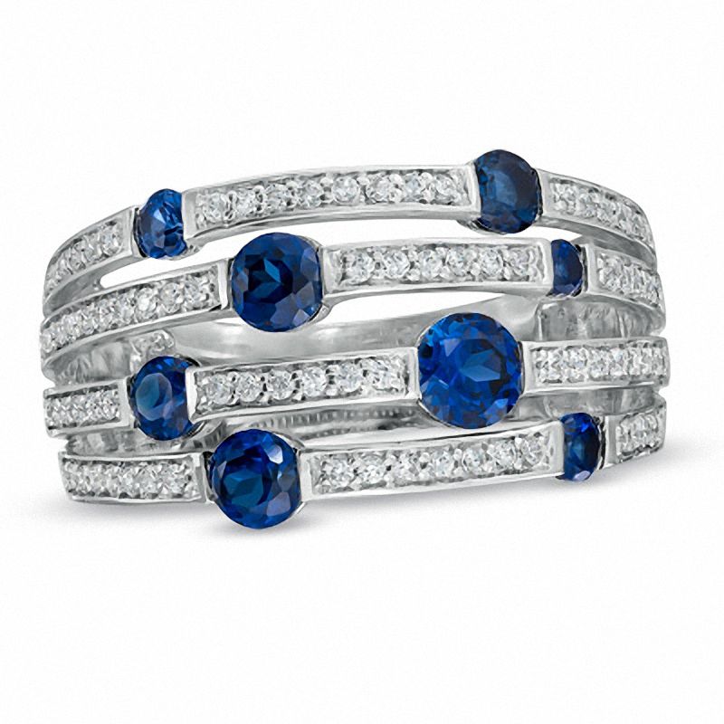 Lab-Created Blue and White Sapphire Orbit Band in Sterling Silver