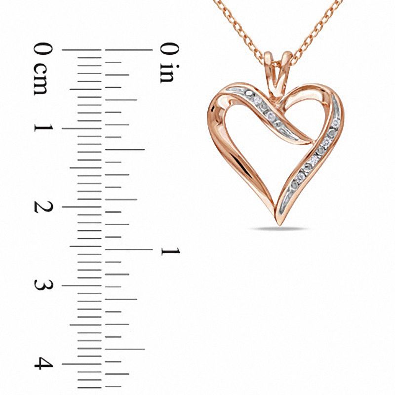 1/20 CT. T.W. Diamond Heart-Shaped Ribbon Pendant in Sterling Silver with Rose Rhodium