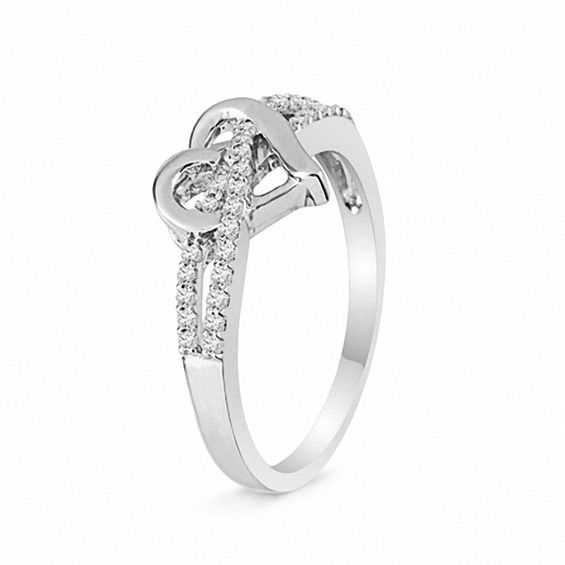 1/8 CT. T.w. Diamond Heart Outline Split Shank Promise Ring in Sterling Silver