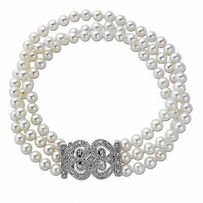 4.5 - 5.0mm Cultured Freshwater Pearl Three Strand Bracelet with 1/8 CT.  T.W. Diamond Clasp in Sterling Silver - 8