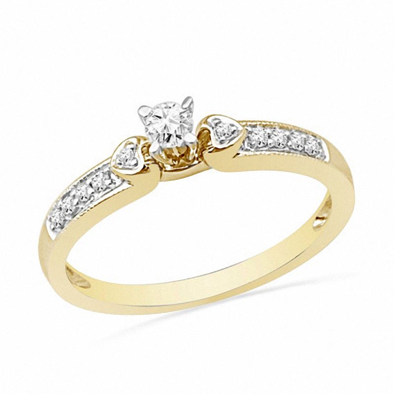 1/5 CT. T.W. Diamond Heart Accent Promise Ring in 10K Gold