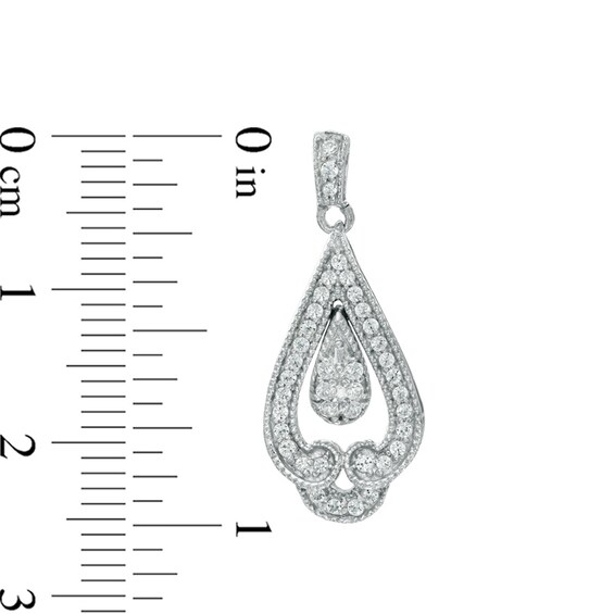 1/2 CT. T.w. Diamond Looped Double Teardrop Earrings in Sterling Silver