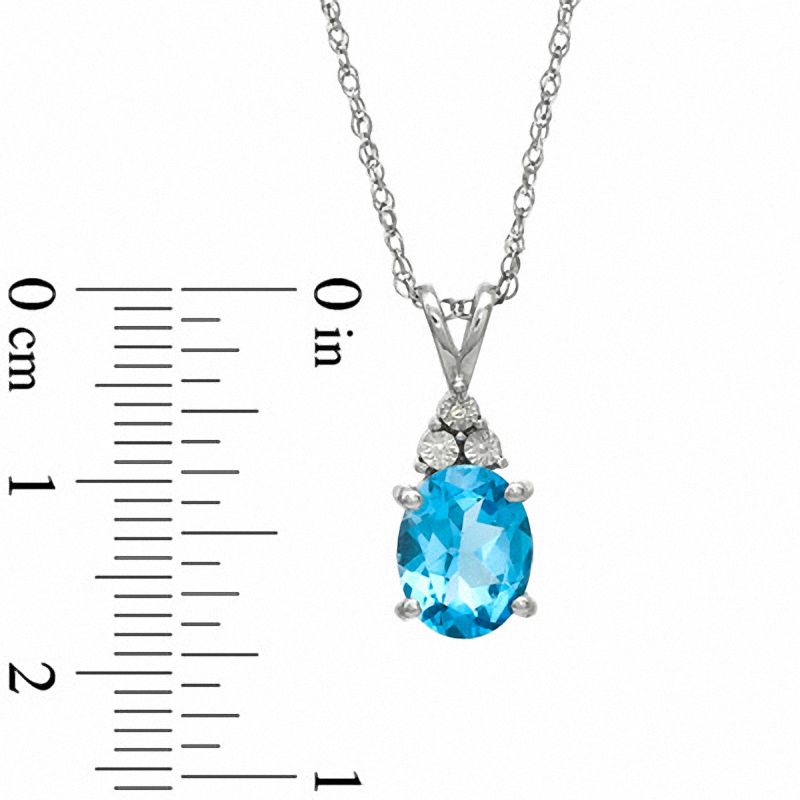 Main Image 4 of Oval Swiss Blue Topaz and Diamond Accent Pendant, Ring and Earrings Set in Sterling Silver - Size 7