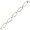 Thumbnail Image 0 of Diamond-Cut Fashion Link Bracelet in 10K Two-Tone Gold - 7.25"