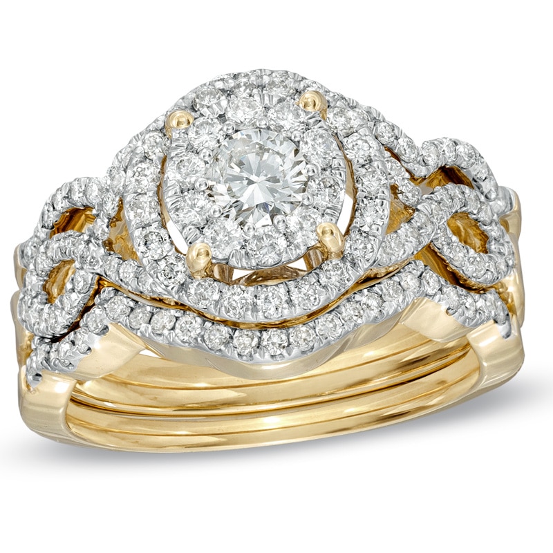 Main Image 1 of 1-1/4 CT. T.W. Diamond Vintage-Style Twist Shank Three-Piece Bridal Set in 14K Gold
