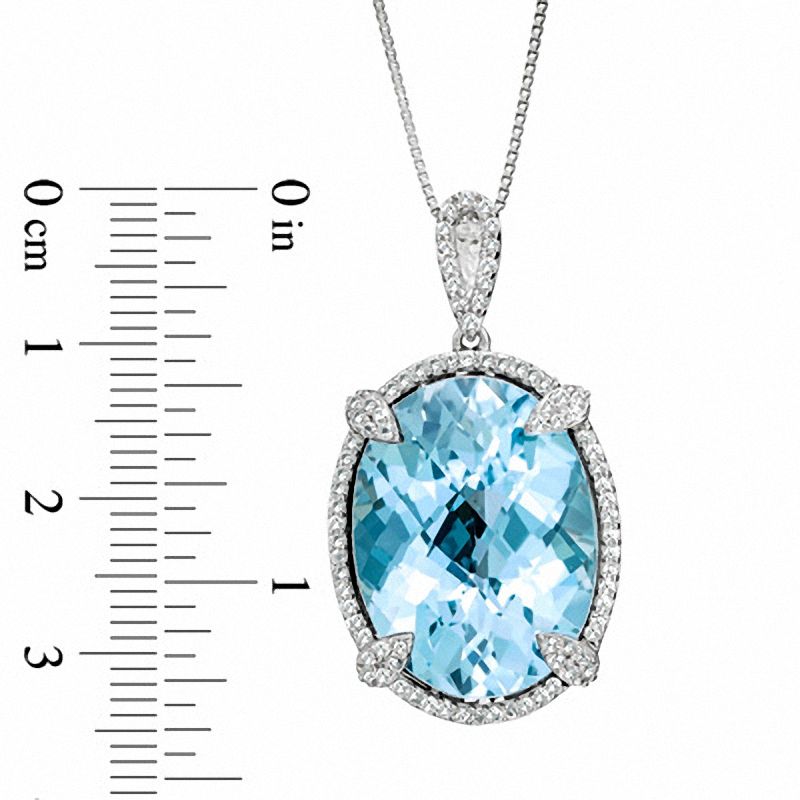 Oval Sky Blue Topaz and Lab-Created White Sapphire Pendant in Sterling Silver