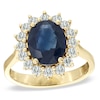 Thumbnail Image 0 of Oval Blue Sapphire and 1/2 CT. T.W. Diamond Frame Engagement Ring in 14K Gold