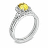 Thumbnail Image 1 of Certified Oval Yellow Sapphire and 1/2 CT. T.W. Diamond Bridal Set in 14K White Gold
