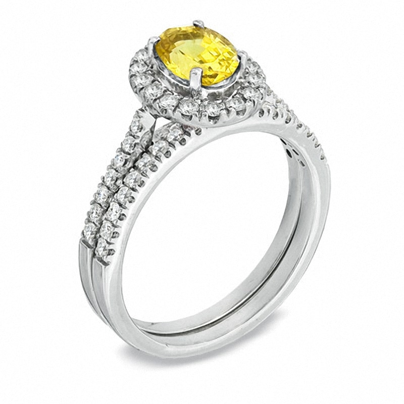 Certified Oval Yellow Sapphire and 1/2 CT. T.W. Diamond Bridal Set in 14K White Gold