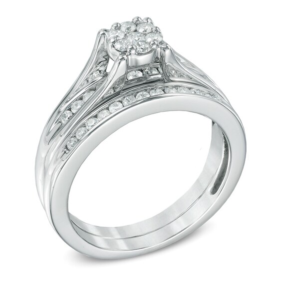 1/2 CT. T.w. Diamond Cluster Bridal Set in 10K White Gold