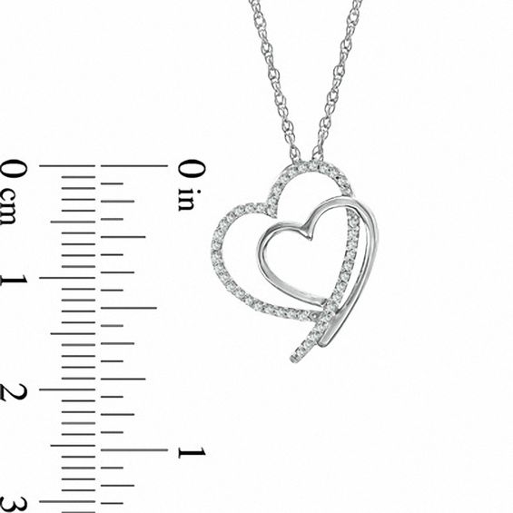 1/8 CT. T.w. Diamond Shadowed Tilted Heart Pendant in Sterling Silver