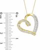 Thumbnail Image 1 of 1/2 CT. T.W. Baguette and Round Diamond Tilted Heart Pendant in 10K Gold