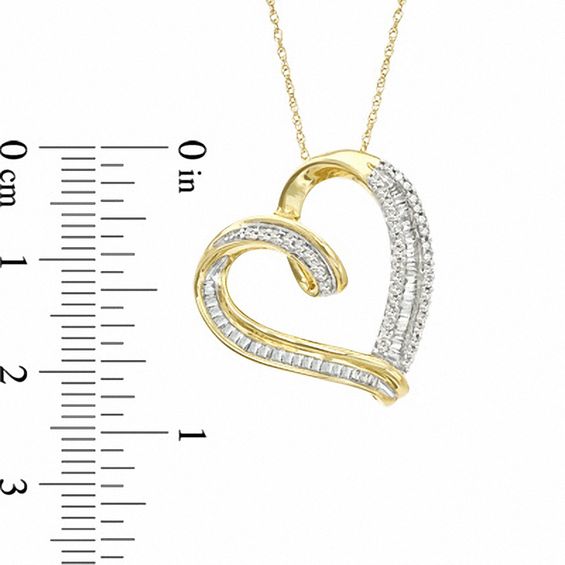 1/2 CT. T.w. Baguette and Round Diamond Tilted Heart Pendant in 10K Gold