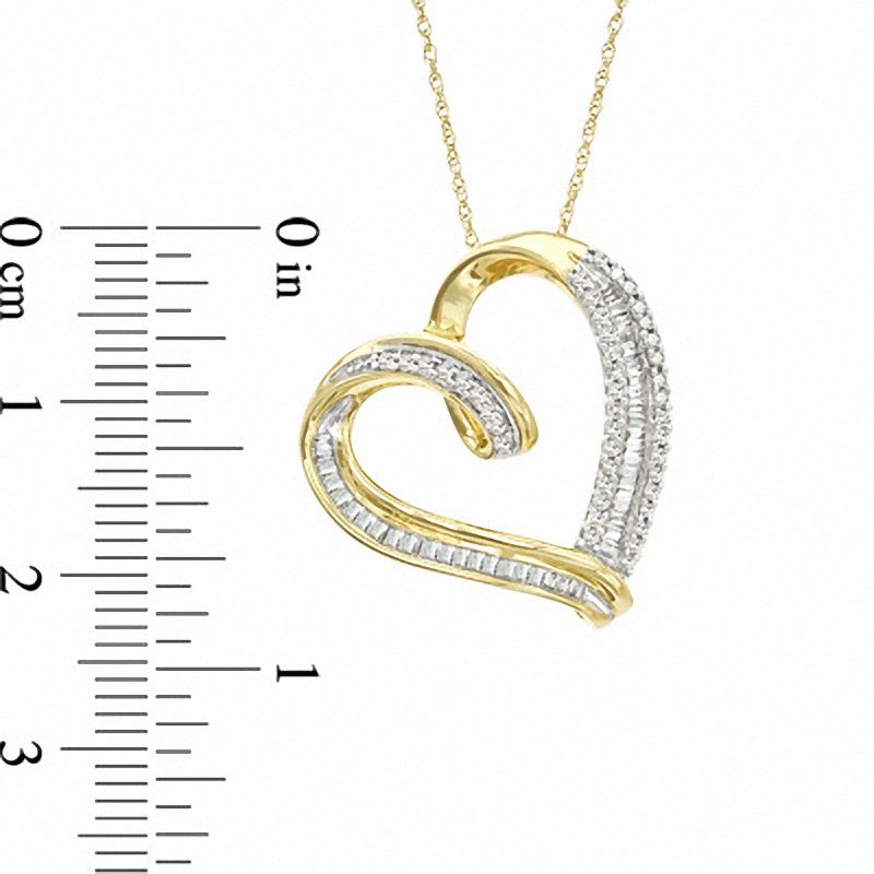 1/2 CT. T.W. Baguette and Round Diamond Tilted Heart Pendant in 10K Gold