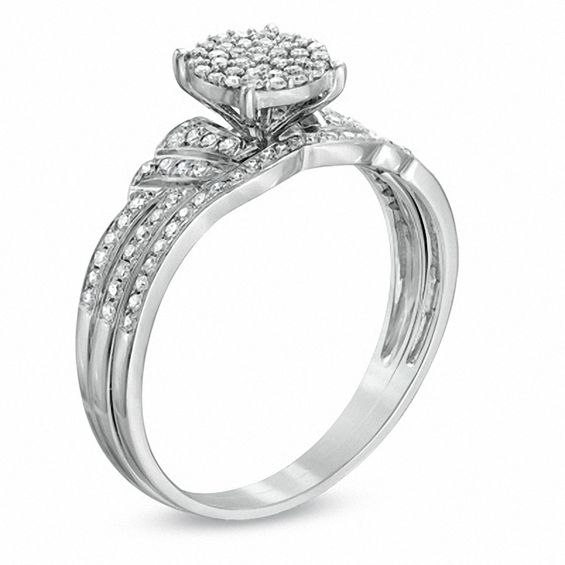 1/4 CT. T.w. Diamond Cluster Bridal Set in 10K White Gold
