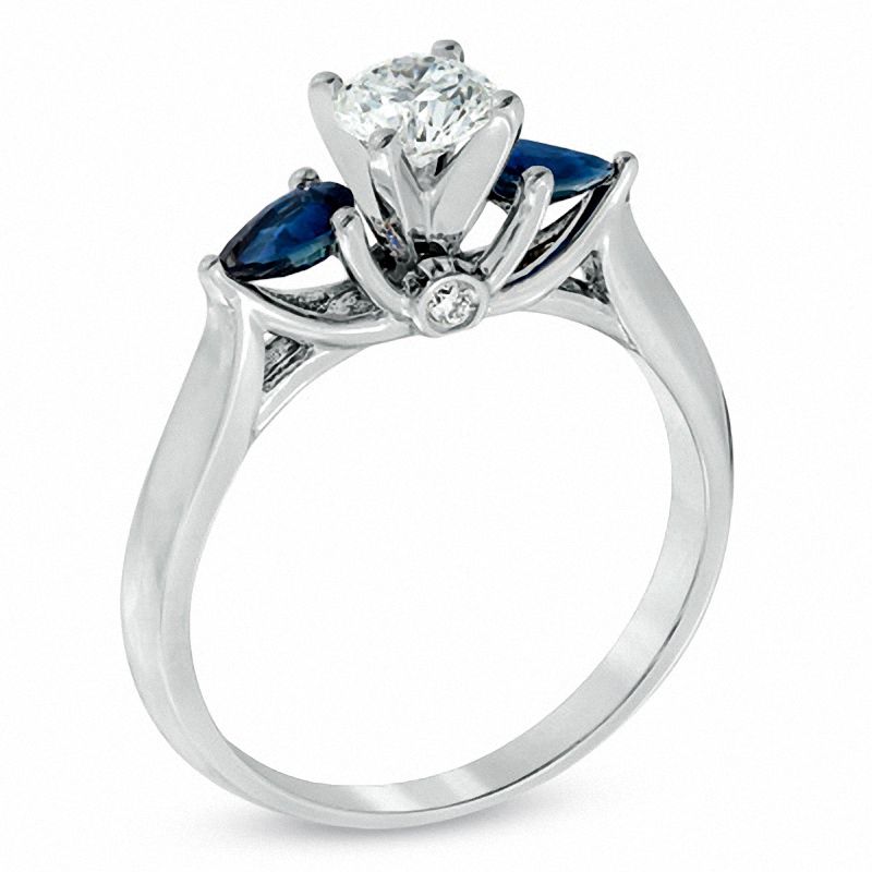 1/2 CT. T.W. Diamond and Pear-Shaped Blue Sapphire Three Stone Ring in 14K White Gold