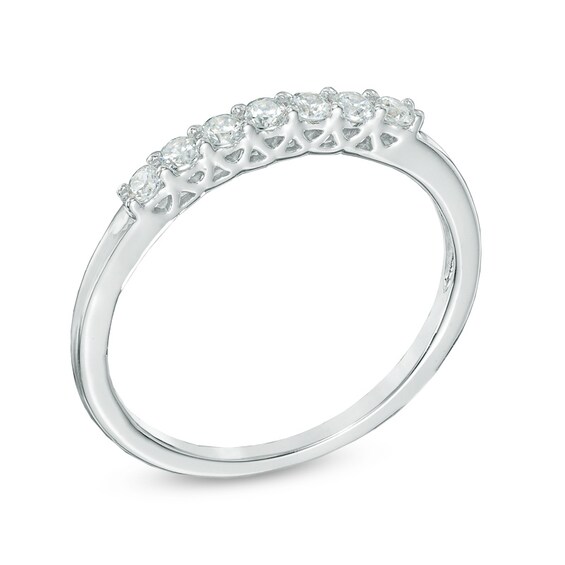 1/5 CT. T.w. Diamond Seven Stone Wedding Band in 10K White Gold
