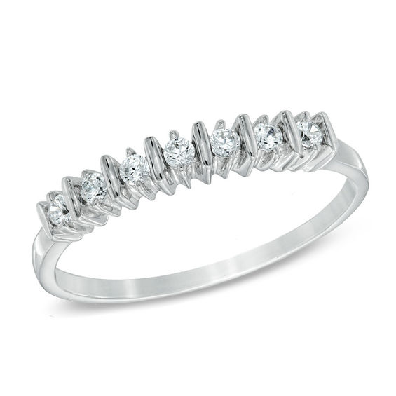 1/10 CT. T.w. Diamond Seven Stone Wedding Band in 10K White Gold
