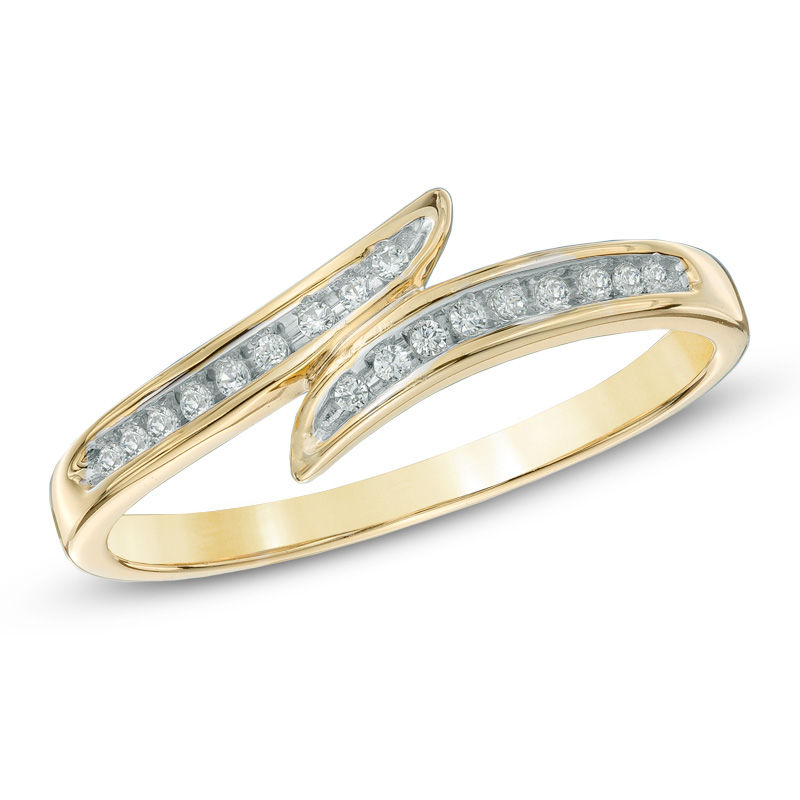 1/10 CT. T.W. Diamond Bypass Ring in 10K Gold