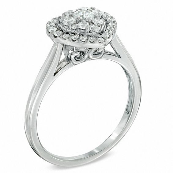 1/2 CT. T.w. Diamond Cluster Heart Frame Engagement Ring in 14K White Gold