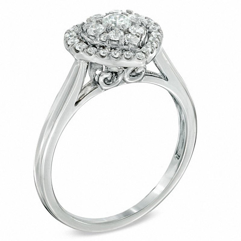 1/2 CT. T.W. Diamond Cluster Heart Frame Engagement Ring in 14K White Gold