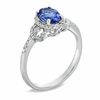 Thumbnail Image 2 of Oval Tanzanite and 1/6 CT. T.W. Diamond Buckle Ring in 10K White Gold