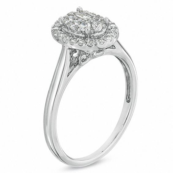 1/2 CT. T.w. Diamond Cluster Oval Frame Engagement Ring in 14K White Gold